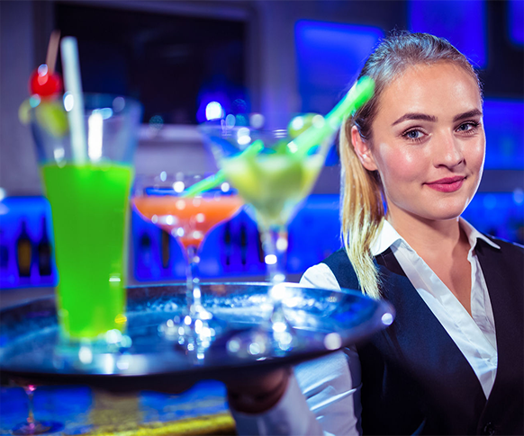 cocktail waitress carrying drink tray